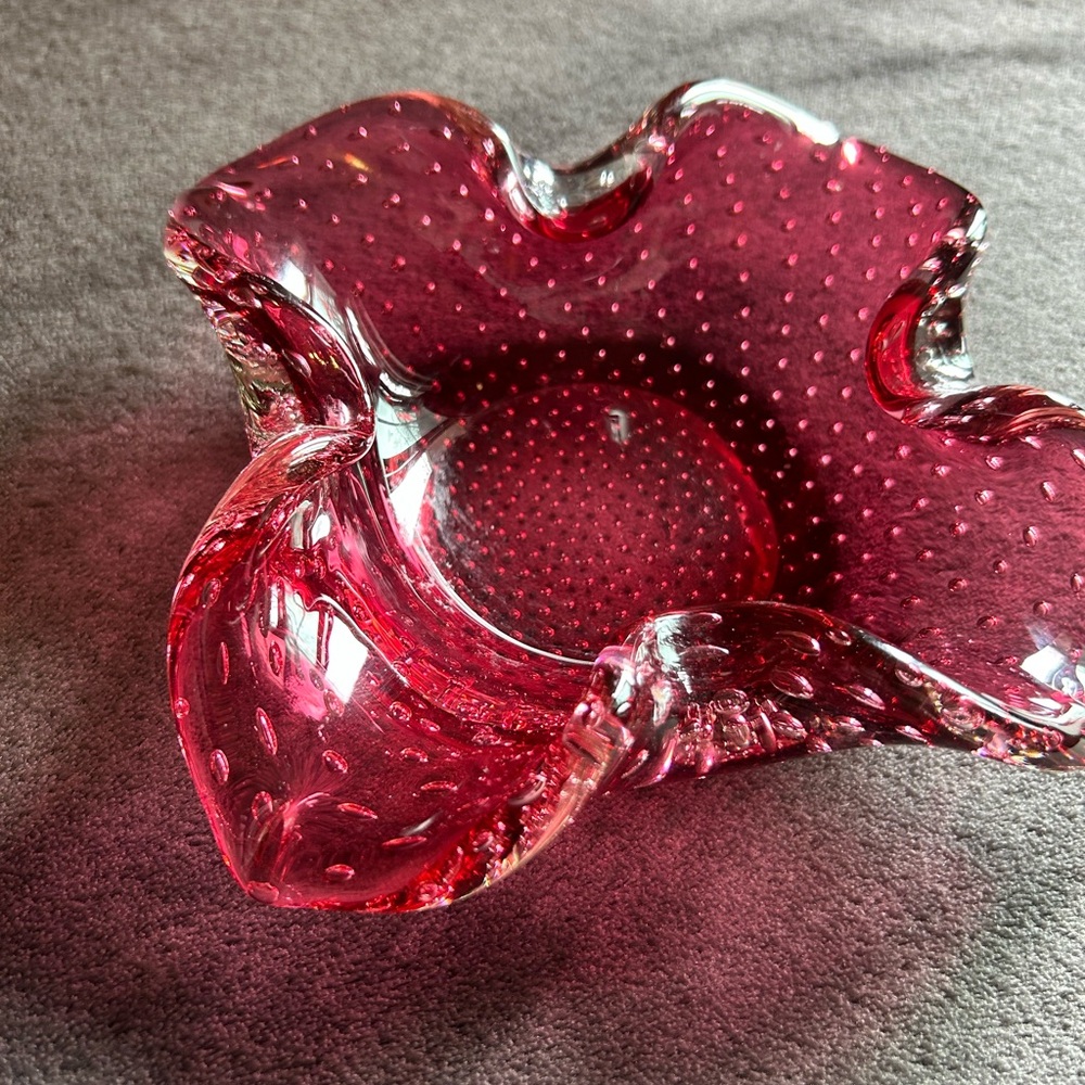 Vibrant Red Glass Art with Organic Fluid Design